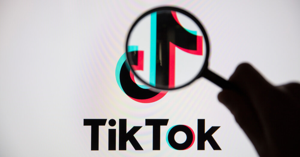 TikTok logo and magnifying glass