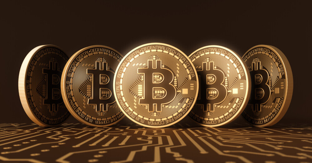 Five Bitcoin coins