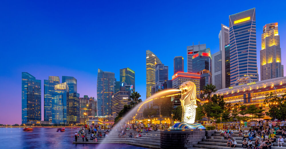 Image of Singapore with crowds of people at night