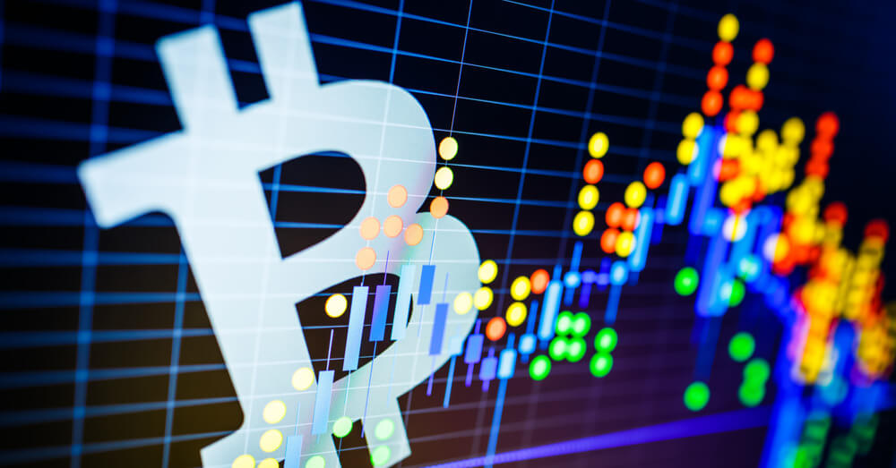 Image of Bitcoin logo with colourful candlestick chart