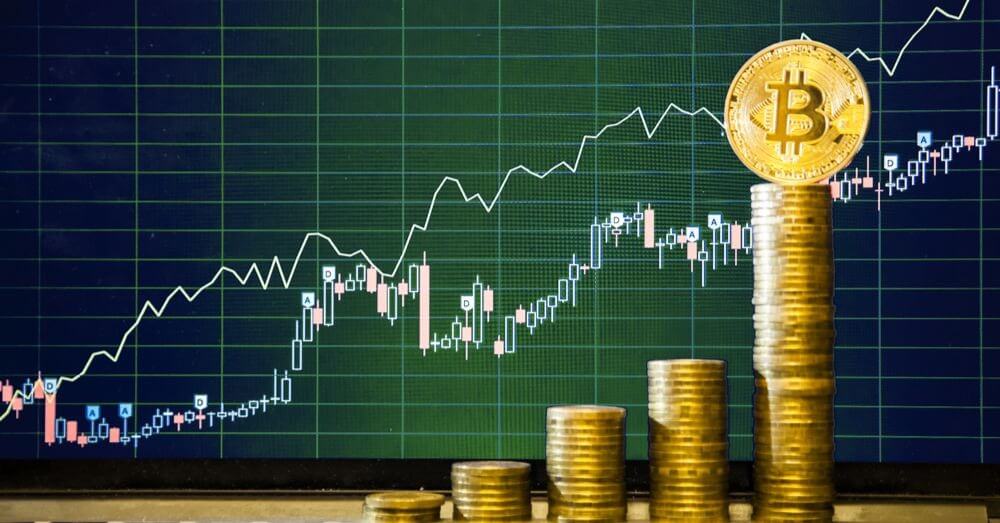 Image of Bitcoin chart with coins in foreground