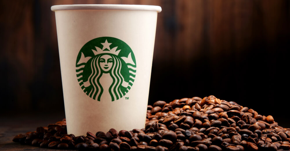 Image of Starbucks cup with coffee beans