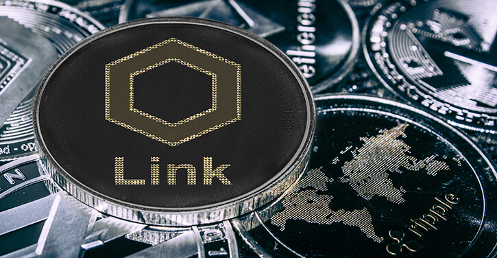 An image of ChainLink token on top of stacked cryptocurrencies