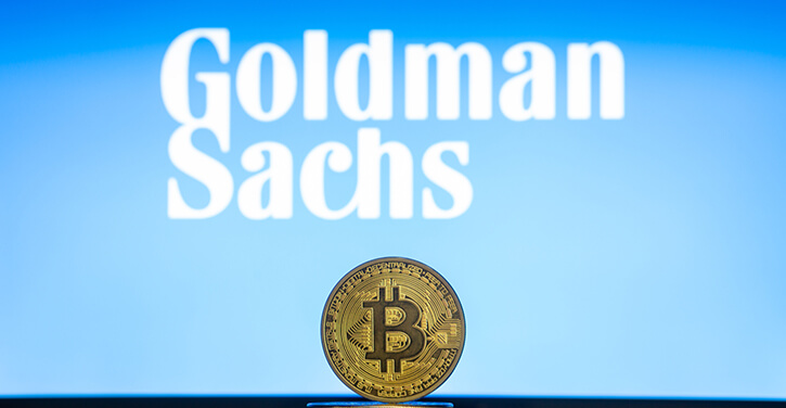 Goldman Sachs logo and Bitcoin