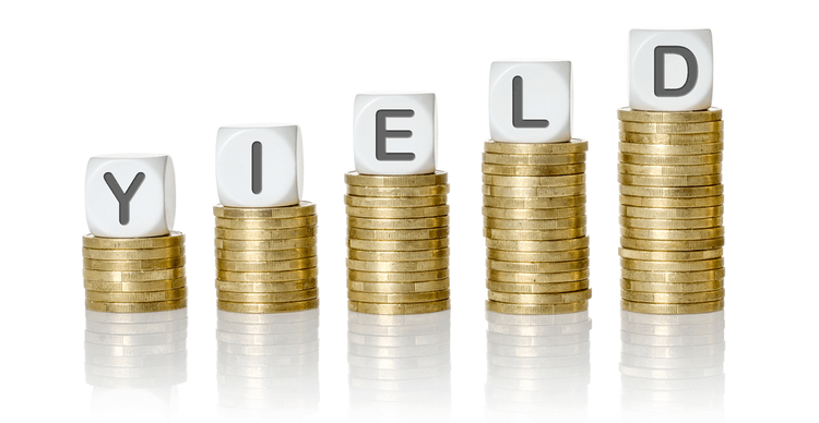 Image of the letters of yield on top of stacks of coins