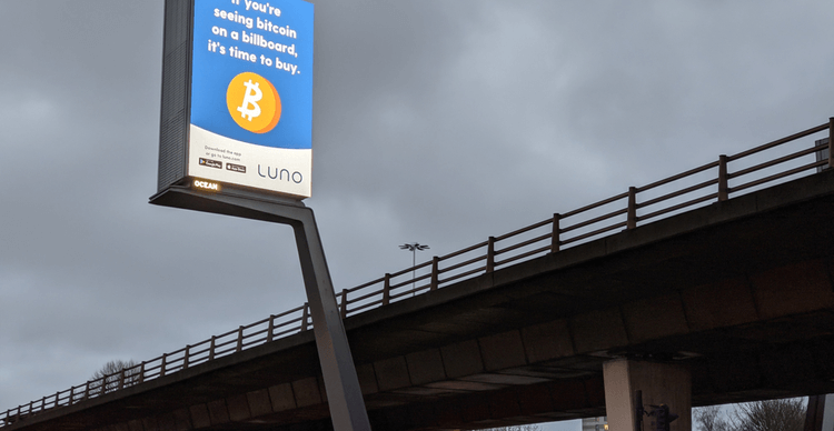 An image showing bitcoin on an ad board