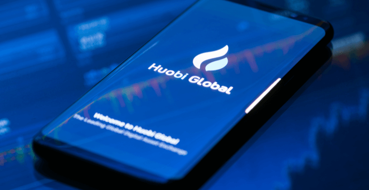 Image of the Huobi logo on a smartphone