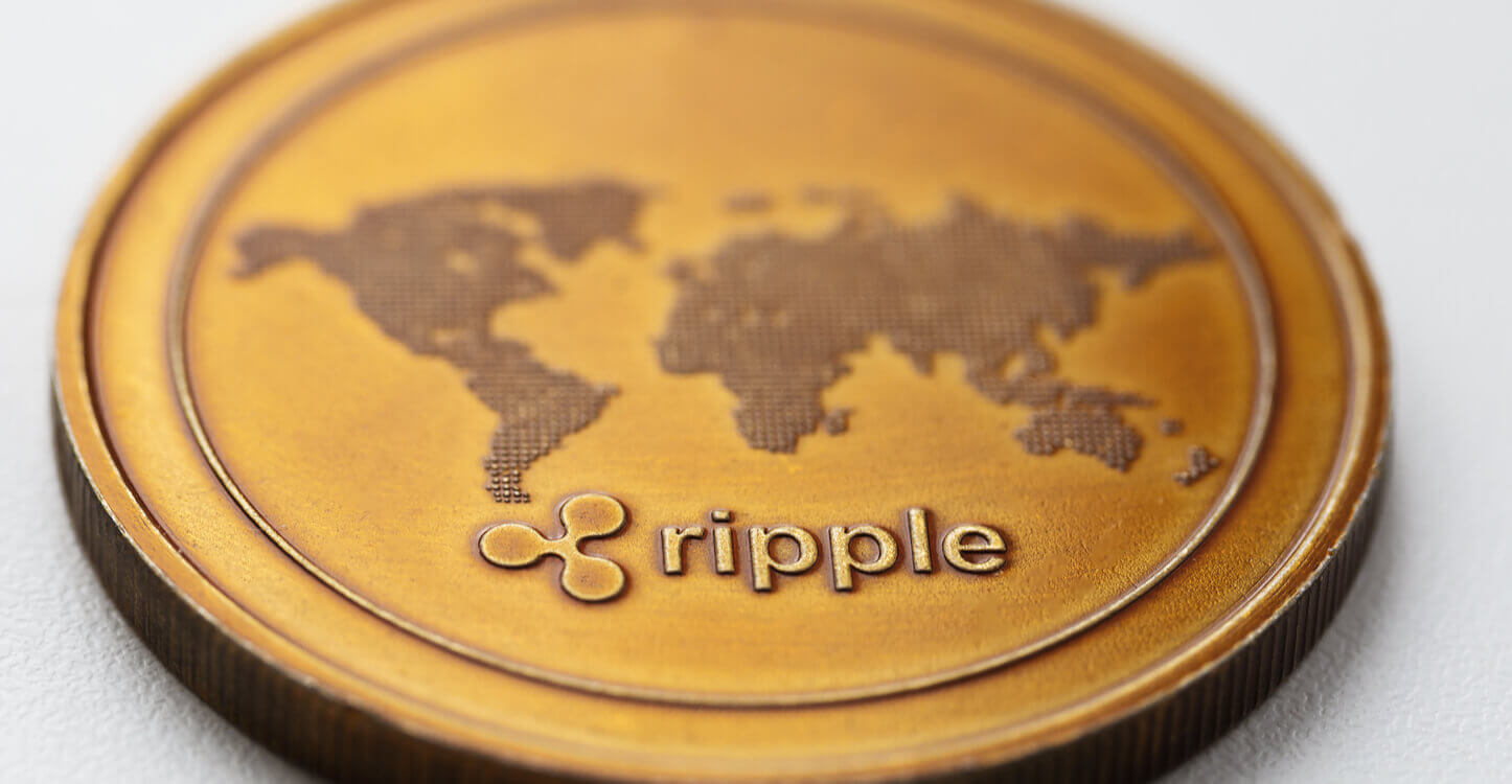 Een close-up foto van de Ripple munt met haar logo