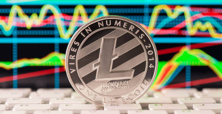 Litecoin met een prijsgrafiek op de achtergrond