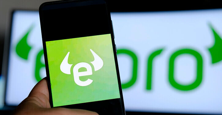 Foto van het eToro symbool op een smartphone