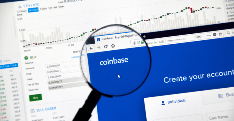 Foto van Coinbase onder een vergrootglas op een scherm