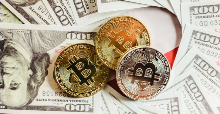 Foto van Bitcoin en Amerikaanse dollars