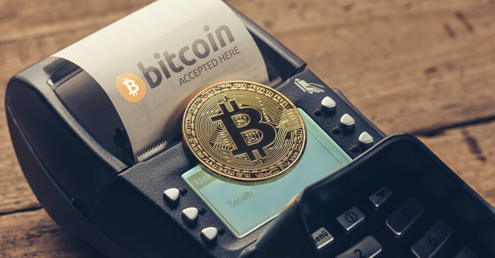 Un Bitcoin sur une machine de paiement