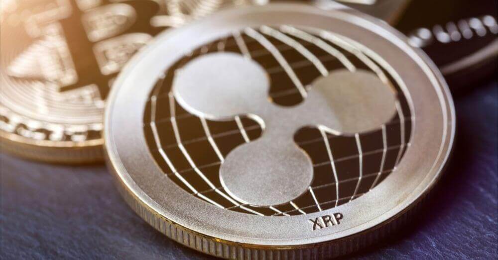 Le crypto coin Ripple avec d'autres actifs en arrière-plan