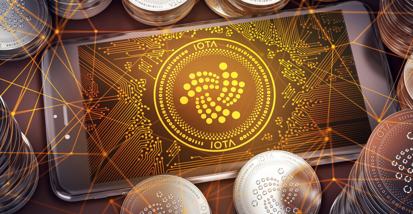 Une image du coin IOTA sur un smartphone