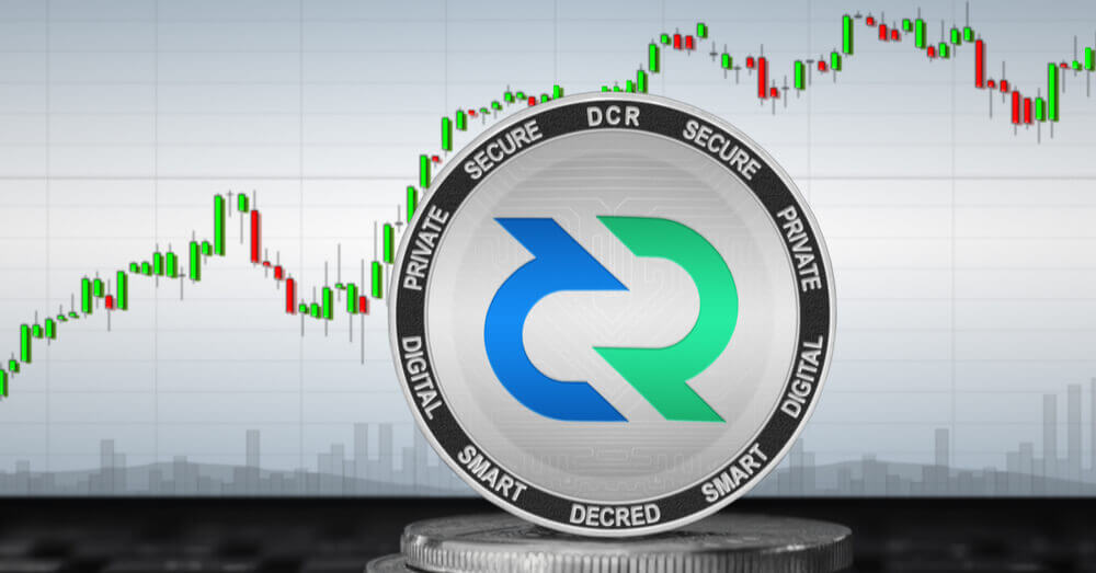 Le coin DCR avec graphique de trading en arrière-plan