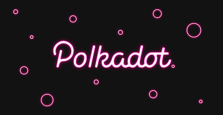 Une image du logo Polkadot éclairé sur un fond sombre