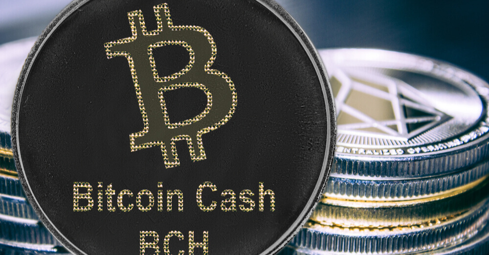 Bitcoin Cash sur fond d'une pile de coins