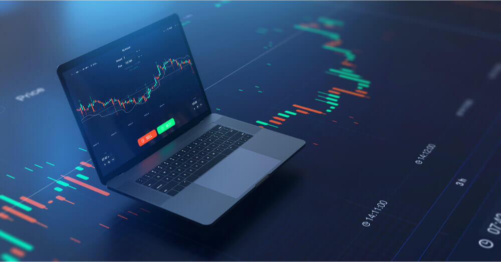 Tableau de trading sur ordinateur portable avec indicateurs techniques