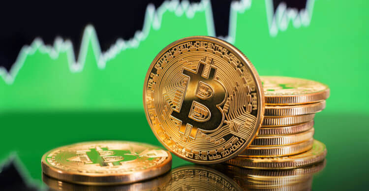 Bitcoins et fond de graphique haussier vert