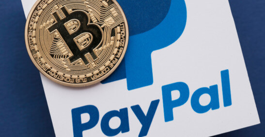 Image d'un bitcoin et du logo de Paypal