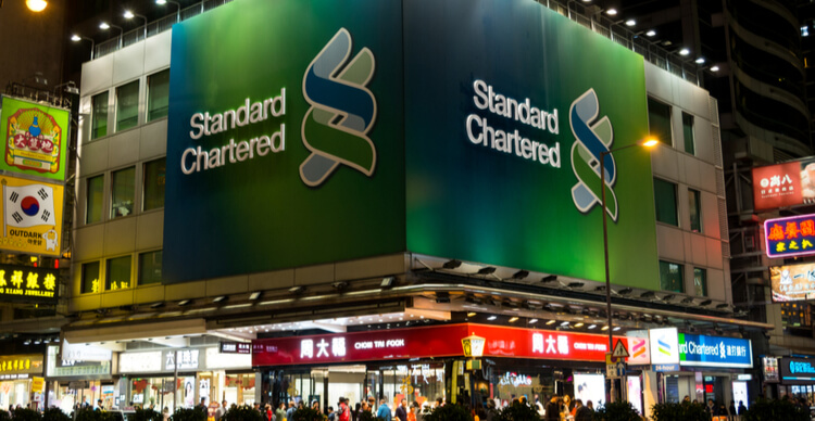 Ein Bild, das das Logo der Standard Chartered Bank zeigt