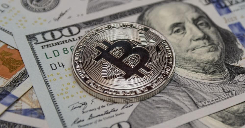 Ein Bild des Bitcoin-Symbols auf US-Dollar