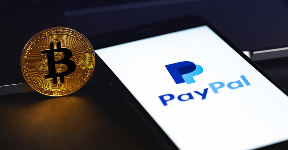 PayPal mit einem Bitcoin. Quelle: Shutterstock