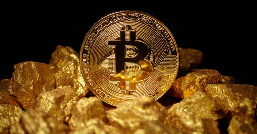 Ein Bild eines Bitcoins auf Goldnuggets