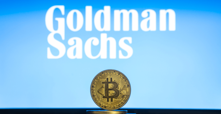 The Goldman Sachs logo with a stack of bitcoins