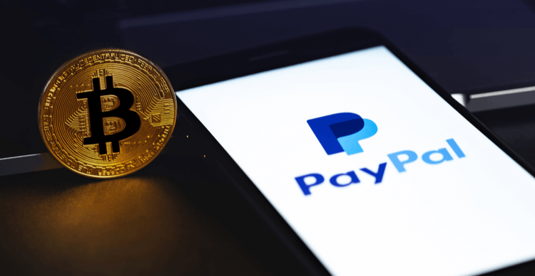 The PayPal logo on a phone with Bitcoin