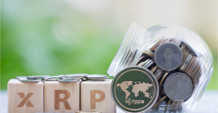 XRP coin and wooden blocks