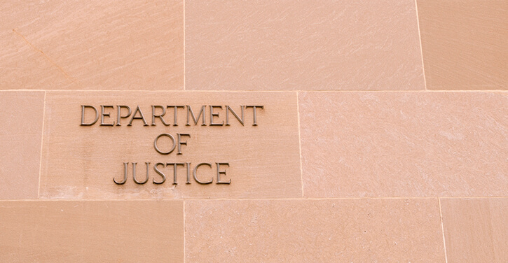 Image of the Department of Justice sign