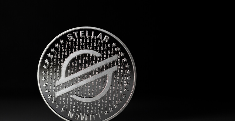 Stellar cryptocurrency physical coin against dark background