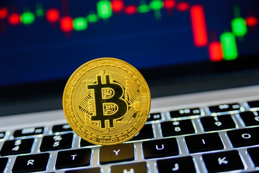 bitcoin cryptocurrency symbol laptop